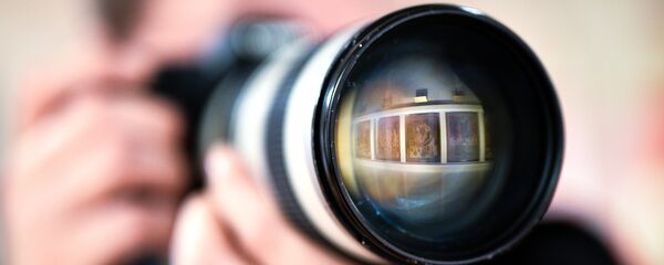 Фотограф. Архивное фото. Фотограф. Архивное фото. - Sputnik Абхазия