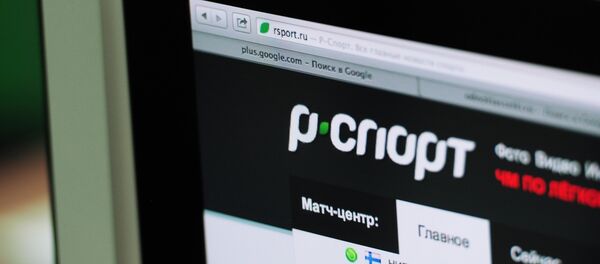 Логотип сайта редакции спортивного агентства Р-Спорт на экране компьютера. - Sputnik Абхазия