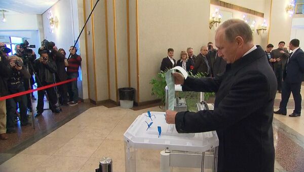 Путин проголосовал на выборах депутатов Государственной думы РФ - Sputnik Абхазия
