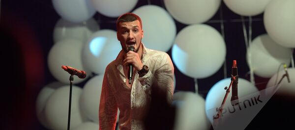 Музыкант Астан Аджинджал Музыкант Астан Аджинджал - Sputnik Абхазия