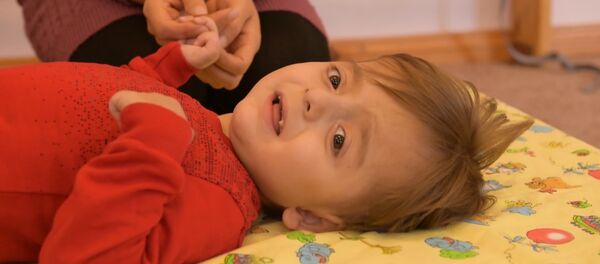 Зарядка для Нестора: как проходит реабилитация ребенка с ДЦП Зарядка для Нестора: как проходит реабилитация ребенка с ДЦП - Sputnik Абхазия