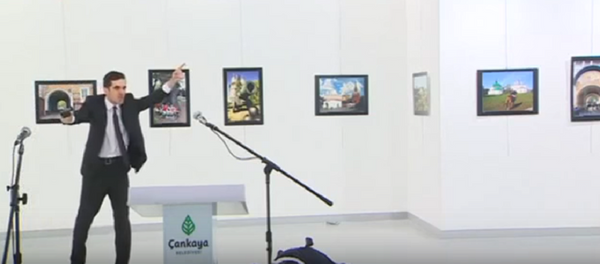 В сети появилось видео момента покушения на посла РФ в Анкаре В сети появилось видео момента покушения на посла РФ в Анкаре - Sputnik Абхазия