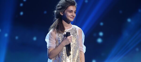 Валериа Адлеиаԥҳа аҩбатәи атур аҟны лықәгылара очамчыраа ахәаԥшуан Очамчыратәи Акультура ахан аҟны. - Sputnik Аҧсны