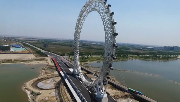 Необычное гигантское колесо обозрения открылось в Китае - Sputnik Абхазия