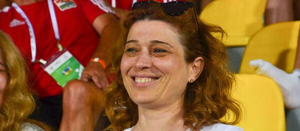 Мать футболиста Руслана Шония Мадина Гарцкия на трибуне во время матча Абхазия-Южная Осетия Мать футболиста Руслана Шония Мадина Гарцкия на трибуне во время матча Абхазия-Южная Осетия - Sputnik Абхазия