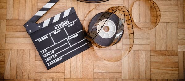 Кинопленка и кинохлопушка Кинопленка и кинохлопушка - Sputnik Абхазия