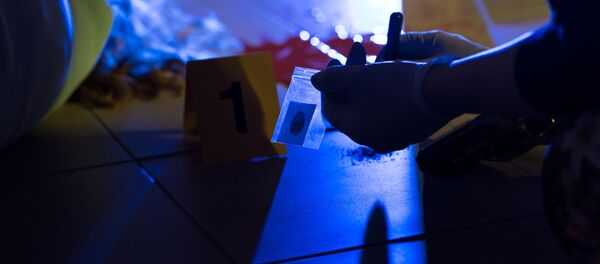 Сотрудник полиции на месте преступления - Sputnik Абхазия