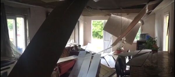 Дом, пострадавший при взрыве склада боеприпасов в Приморском Дом, пострадавший при взрыве склада боеприпасов в Приморском - Sputnik Абхазия