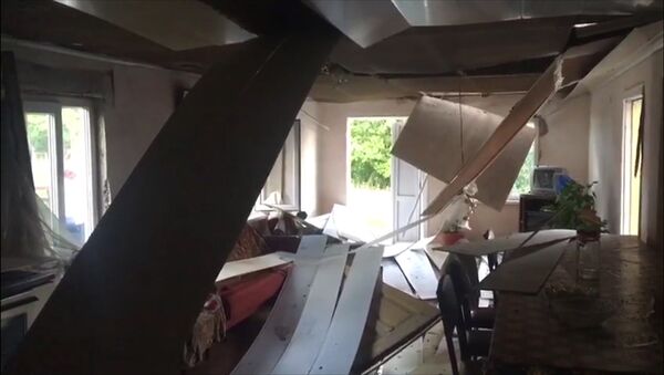 Дом, пострадавший при взрыве склада боеприпасов в Приморском - Sputnik Абхазия