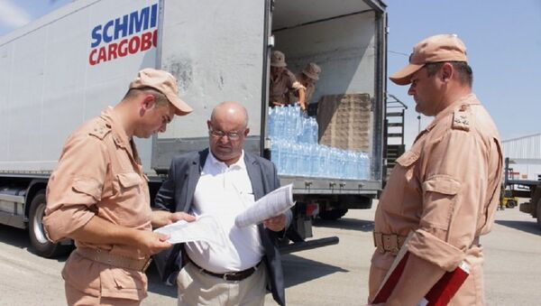 Абхазия отправила в Сирию 12 тонн питьевой воды - Sputnik Абхазия