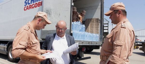 Абхазия отправила в Сирию 12 тонн питьевой воды - Sputnik Абхазия