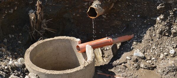 Прокладка канализации на улице Имама Шамиля Прокладка канализации на улице Имама Шамиля - Sputnik Аҧсны