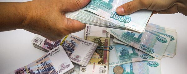 Рублевые купюры разного достоинства Рублевые купюры разного достоинства - Sputnik Абхазия