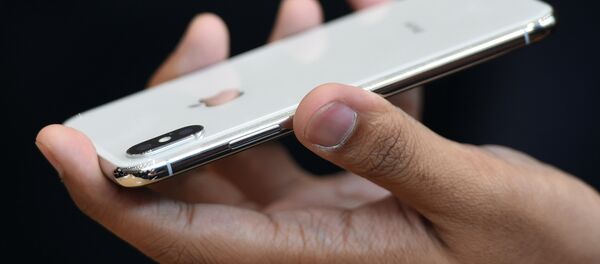Новый iPhone X показан во время медиа-мероприятия в новом офисе Apple в Купертино, Калифорния - Sputnik Абхазия