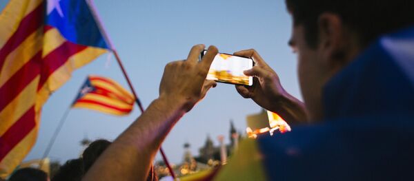 Акция в Барселоне, посвященная референдуму о независимости Каталонии Акция в Барселоне, посвященная референдуму о независимости Каталонии - Sputnik Абхазия