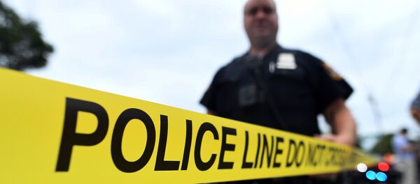 Сотрудник полиции США, архивное фот Сотрудник полиции США, архивное фот - Sputnik Аҧсны