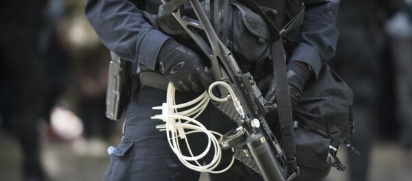 Сотрудник полиции США Сотрудник полиции США - Sputnik Абхазия