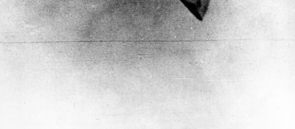 Одна из редких фотографий НЛО необычной формы Одна из редких фотографий НЛО необычной формы - Sputnik Абхазия