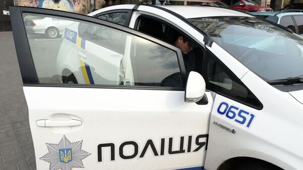Сотрудник украинской полиции в Киеве - Sputnik Аҧсны