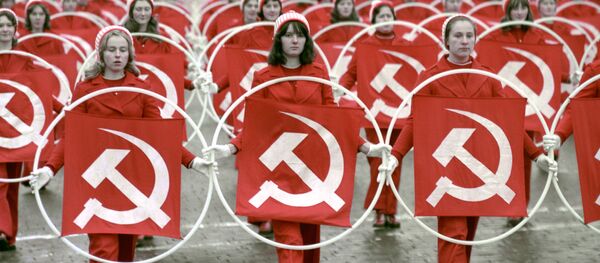 Физкультурники на Красной площади во время празднования 58-й годовщины Великой Октябрьской социалистической революции, 1975 год Физкультурники на Красной площади во время празднования 58-й годовщины Великой Октябрьской социалистической революции, 1975 год - Sputnik Абхазия