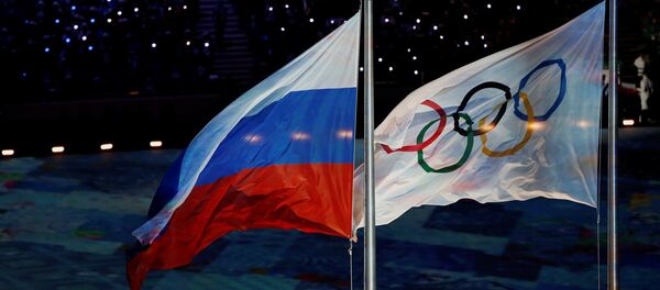 Флаг России и флаг Олимпиады Флаг России и флаг Олимпиады - Sputnik Абхазия