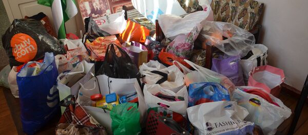 Собранные пакеты с вещами Собранные пакеты с вещами - Sputnik Абхазия