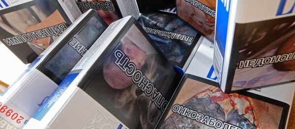 Продажа сигарет с картинками, предупреждающими о вреде курения Продажа сигарет с картинками, предупреждающими о вреде курения - Sputnik Аҧсны