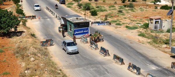 Контрольно-пропускной пункт в городе Идлиб, Сирия, 18 июля 2017 года Контрольно-пропускной пункт в городе Идлиб, Сирия, 18 июля 2017 года - Sputnik Абхазия