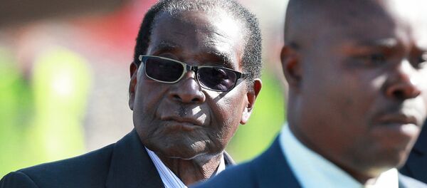 Президент Республики Зимбабве Роберт Мугабе(слева), архивное фото Президент Республики Зимбабве Роберт Мугабе(слева), архивное фото - Sputnik Абхазия
