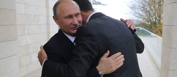 Президент России Владимир Путин и президент Сирии Башар Асад во время встречи - Sputnik Абхазия