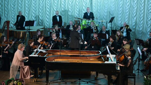 Дуэтный концерт Piano Duo в Абхазской Государственной филармонии имени Рождена Гумба - Sputnik Абхазия
