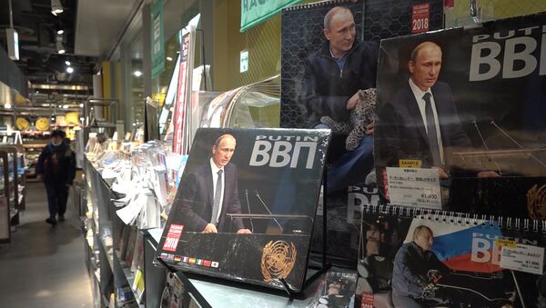 В Токио раскупают календари на 2018 год с изображением Путина - Sputnik Абхазия