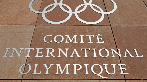 Олимпийский символ на здании штаб-квартиры Международного олимпийского комитета (МОК) в Лозанне - Sputnik Аҧсны