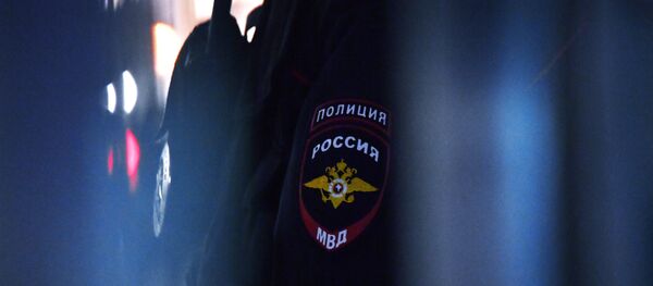 Нашивка на рукаве сотрудника полиции в России, архивное фото Нашивка на рукаве сотрудника полиции в России, архивное фото - Sputnik Абхазия