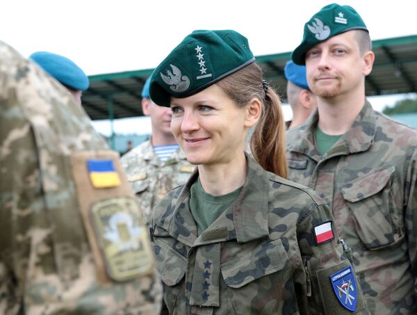 Военнослужащие армии Польши на церемонии открытия военных учений Rapid Trident-2017 - Sputnik Абхазия