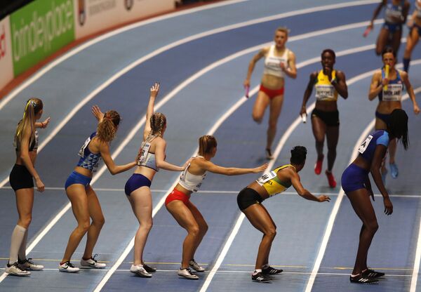 Участницы финала женской эстафеты 4x400 м на Чемпионате мира по легкой атлетике в Бирмингеме, Великобритания - Sputnik Абхазия