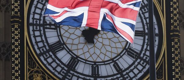 Флаг Великобритании на фоне часов Биг Бен в Лондоне. - Sputnik Абхазия
