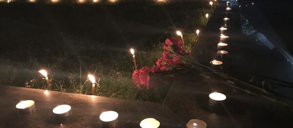 Память жертв пожара в Кемерово почтили в Гудауте у памятника Латской трагедии - Sputnik Абхазия