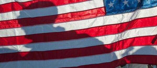 Флаг Соединённых Штатов Америки на демонстрации военной техники и вооружения НАТО в Латвии Флаг Соединённых Штатов Америки на демонстрации военной техники и вооружения НАТО в Латвии - Sputnik Абхазия