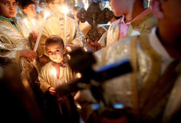 Палестинские христиане во время пасхальной службы в секторе Газа. - Sputnik Абхазия