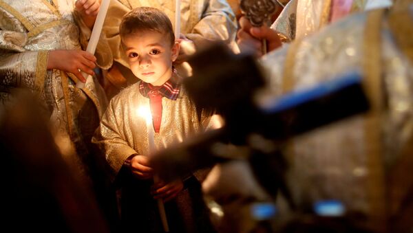 Палестинские христиане во время пасхальной службы в секторе Газа - Sputnik Абхазия