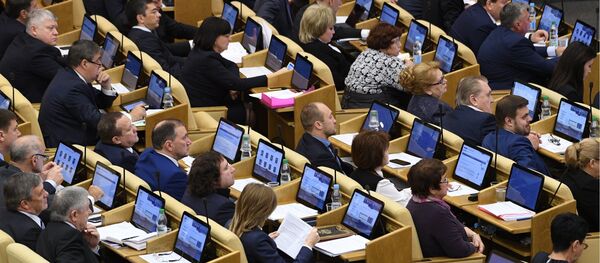 Депутаты на пленарном заседании Государственной Думы РФ Депутаты на пленарном заседании Государственной Думы РФ - Sputnik Аҧсны