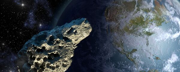 Астероид на фоне Земли Астероид на фоне Земли - Sputnik Абхазия