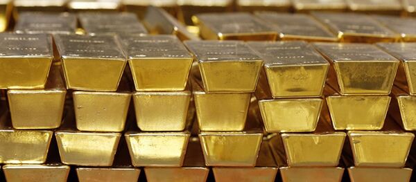 Золотые слитки. Архивное фото Золотые слитки. Архивное фото - Sputnik Абхазия