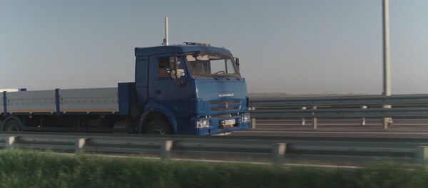 На подходе к Крымскому мосту испытали беспилотные автомобили На подходе к Крымскому мосту испытали беспилотные автомобили - Sputnik Абхазия