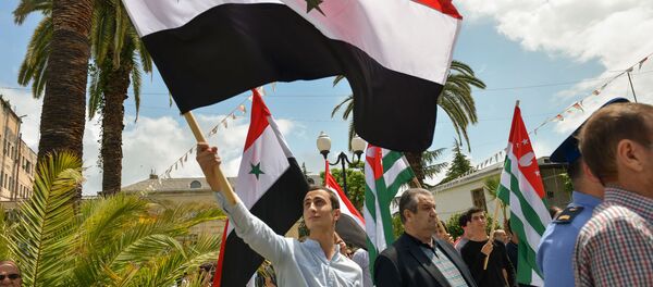 Митинг, посвященный признанию Абхазии Сирийской Арабской Республикой Митинг, посвященный признанию Абхазии Сирийской Арабской Республикой - Sputnik Абхазия