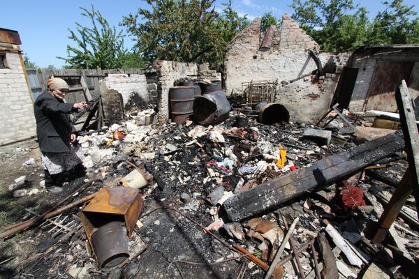 Последствия обстрела жилого дома в Докучаевске - Sputnik Абхазия