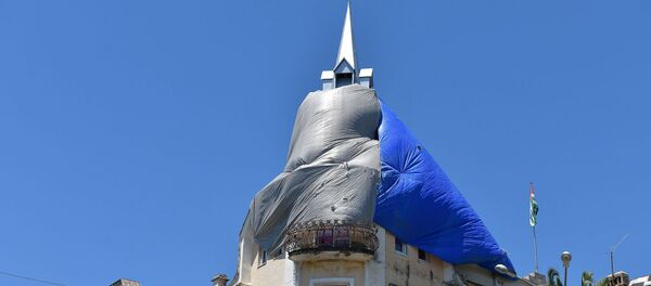 Ремонт башенных часов на здании администрации города Сухум Ремонт башенных часов на здании администрации города Сухум - Sputnik Абхазия