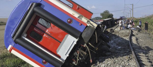 перевернутый поезд вблизи деревни Текирдаг в Турции, 8 июля 2018 перевернутый поезд вблизи деревни Текирдаг в Турции, 8 июля 2018 - Sputnik Абхазия