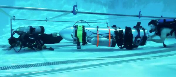 Испытания мини-субмарины, которую Американский миллионер Илон Маск предложил использовать для спасения подростков, заблокированных в пещере в Таиланде Испытания мини-субмарины, которую Американский миллионер Илон Маск предложил использовать для спасения подростков, заблокированных в пещере в Таиланде - Sputnik Абхазия